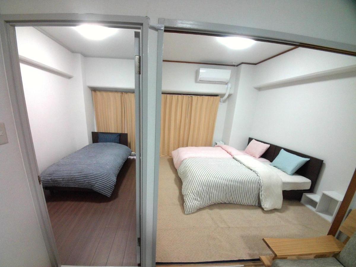 Near Tram Apartment Окаяма Экстерьер фото