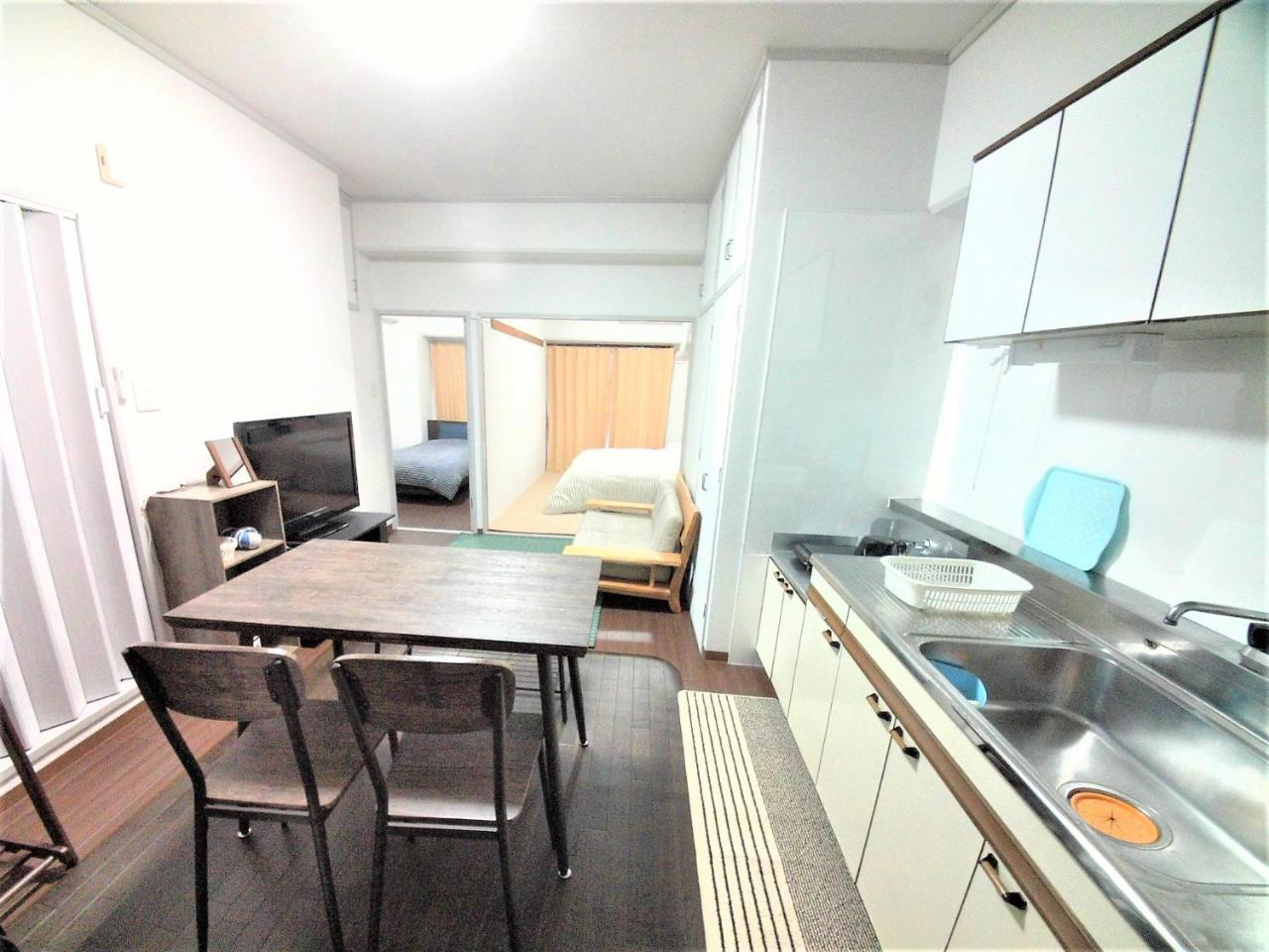 Near Tram Apartment Окаяма Экстерьер фото
