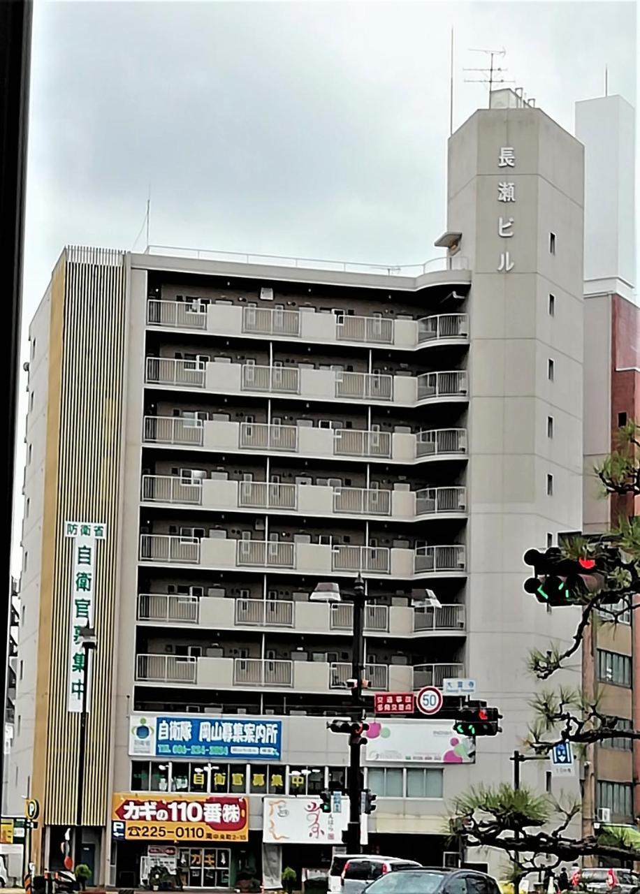 Near Tram Apartment Окаяма Экстерьер фото