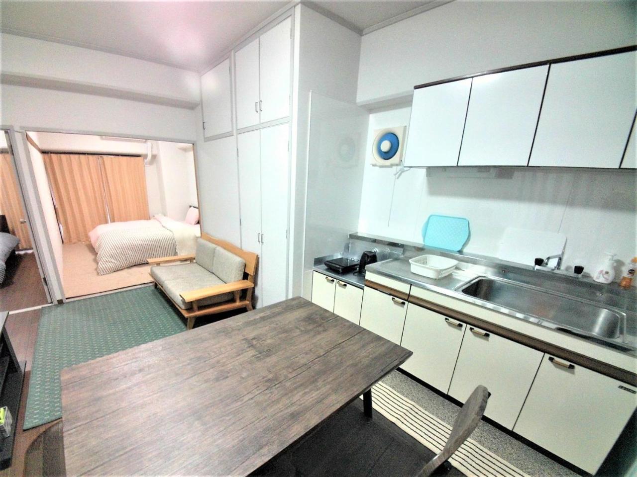 Near Tram Apartment Окаяма Экстерьер фото