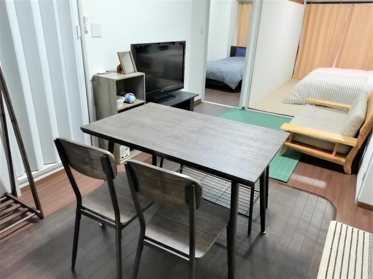Near Tram Apartment Окаяма Экстерьер фото