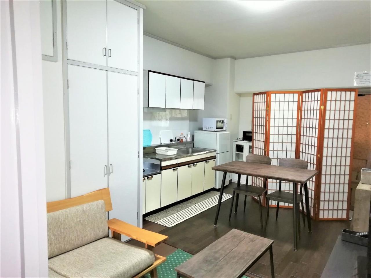Near Tram Apartment Окаяма Экстерьер фото