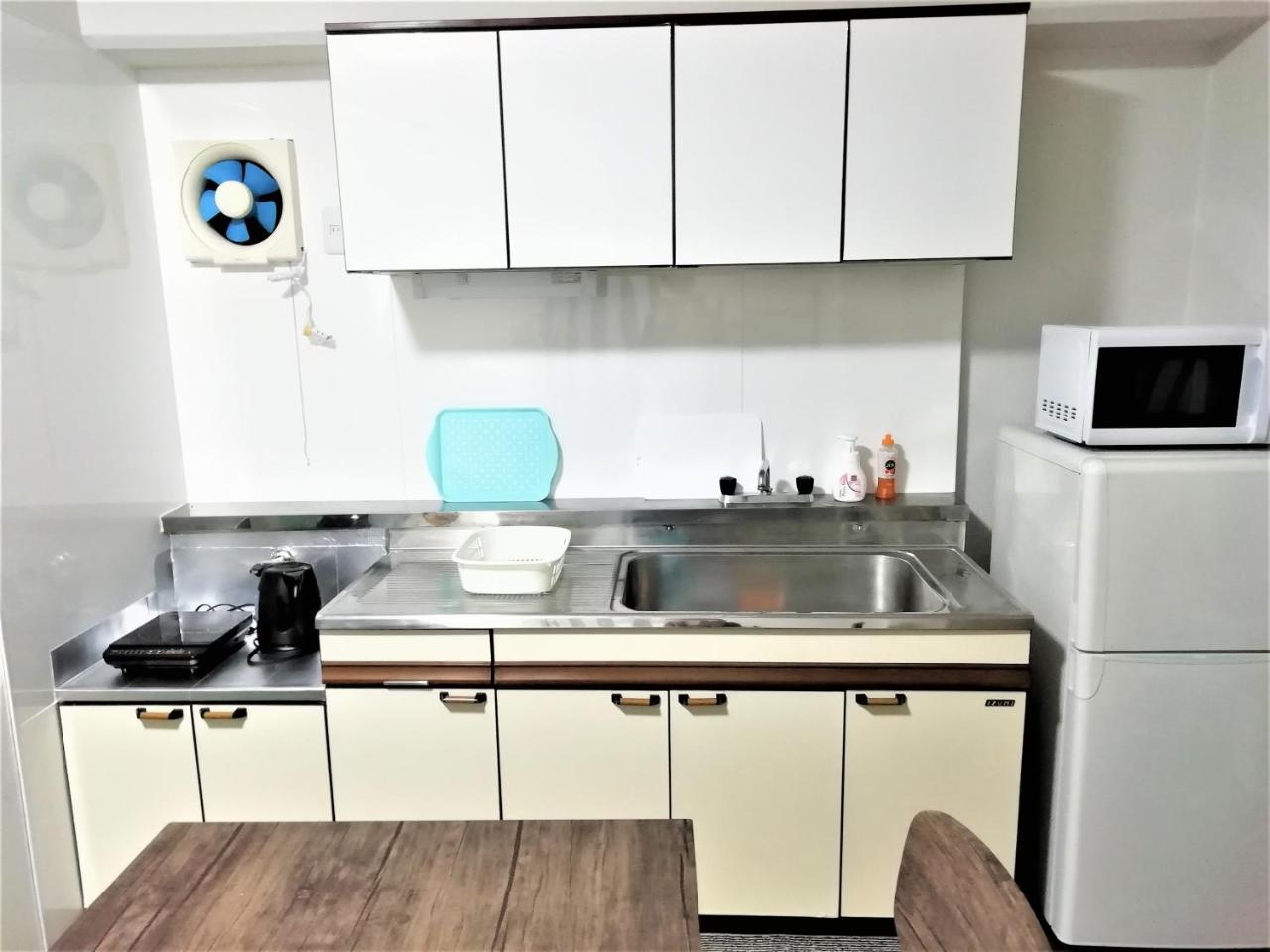 Near Tram Apartment Окаяма Экстерьер фото